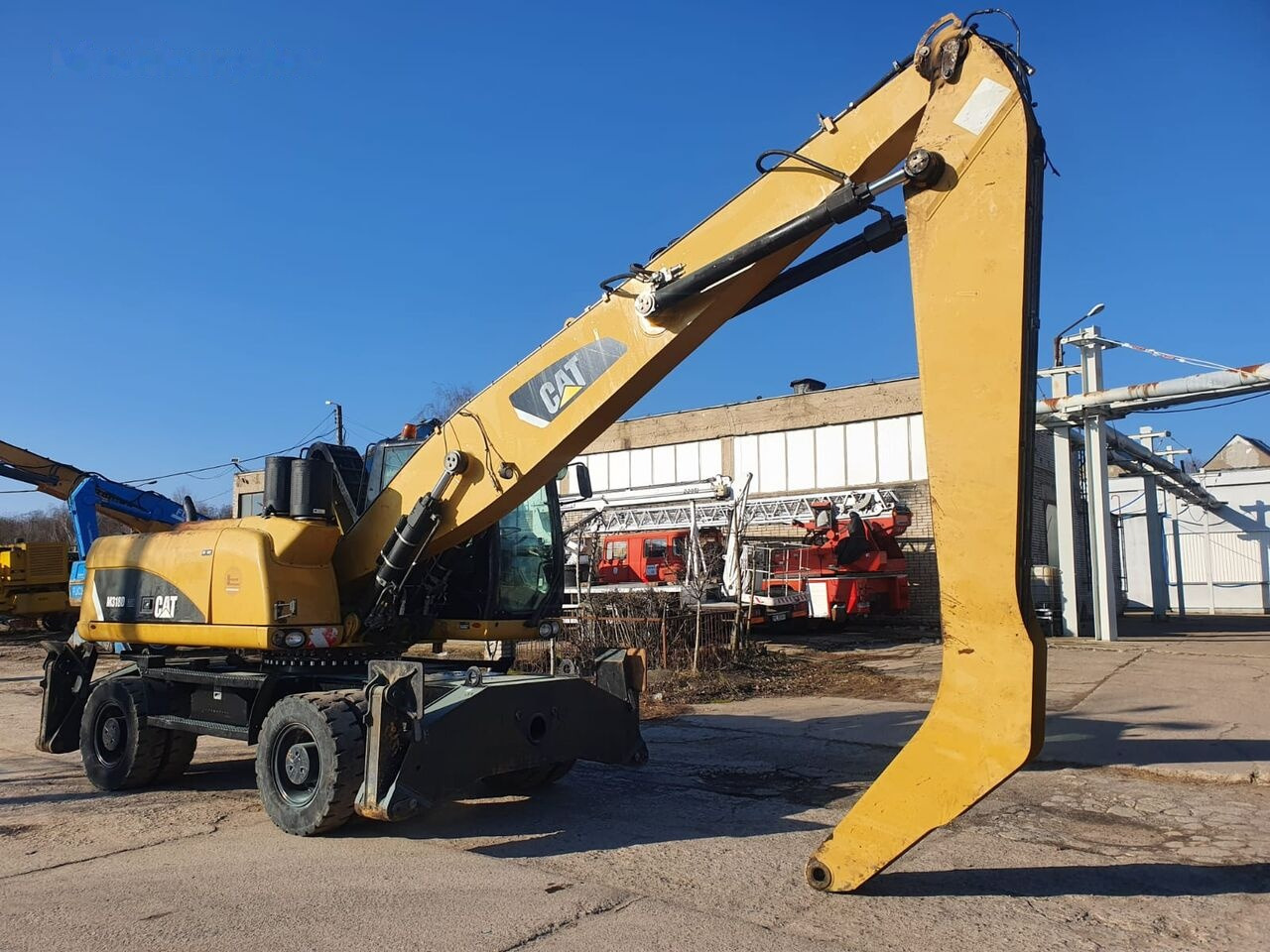 Manipulador de materiales Caterpillar 318 D MH: foto 7