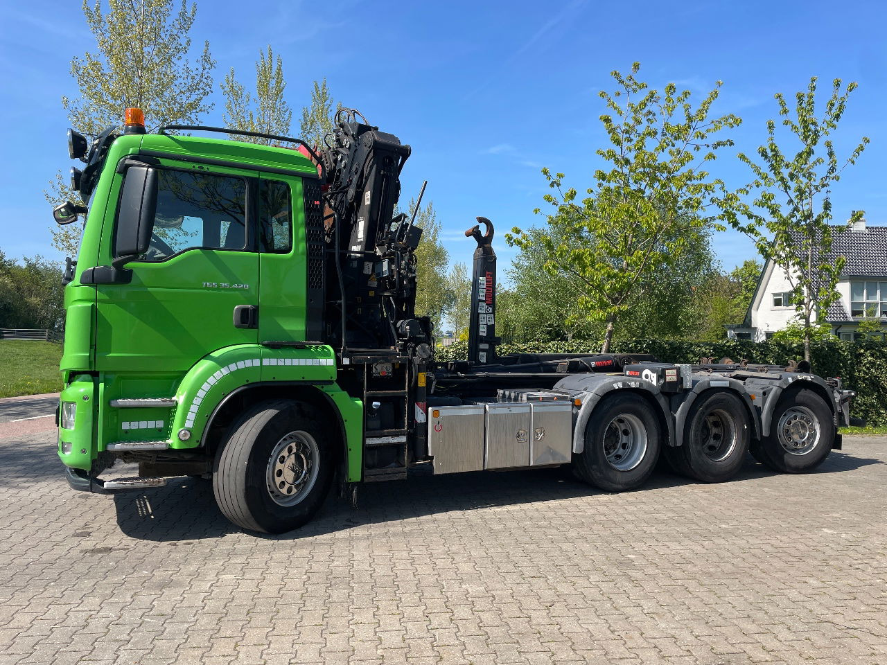 MAN TGS 35.420 met hiab 19tm Z kraan en 26t haakarm, bouwjaar 2018 - Camión portacontenedore/ Intercambiable, Camión grúa: foto 1 MAN TGS 35.420 met hiab 19tm Z kraan en 26t haakarm, bouwjaar 2018 - Camión portacontenedore/ Intercambiable, Camión grúa: foto 1