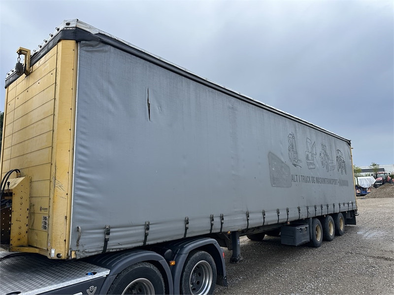 Schmitz Cargobull Machine transport trailer with bag ramp - Semirremolque góndola rebajadas: foto 4 Schmitz Cargobull Machine transport trailer with bag ramp - Semirremolque góndola rebajadas: foto 4
