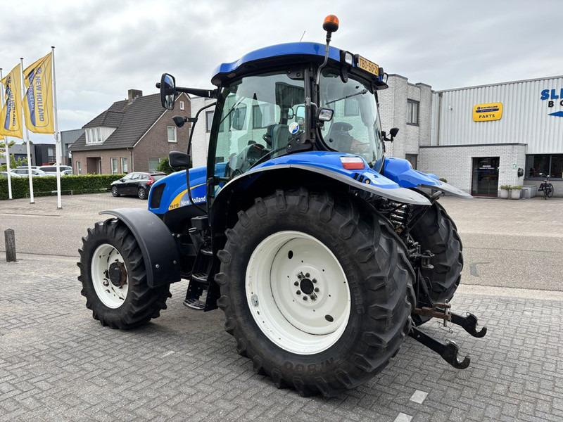 New Holland T6010 Plus Supersteer - Tractor: foto 2 New Holland T6010 Plus Supersteer - Tractor: foto 2