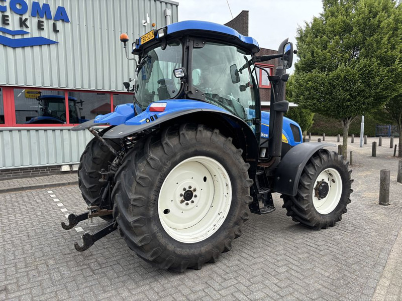 New Holland T6010 Plus Supersteer - Tractor: foto 3 New Holland T6010 Plus Supersteer - Tractor: foto 3