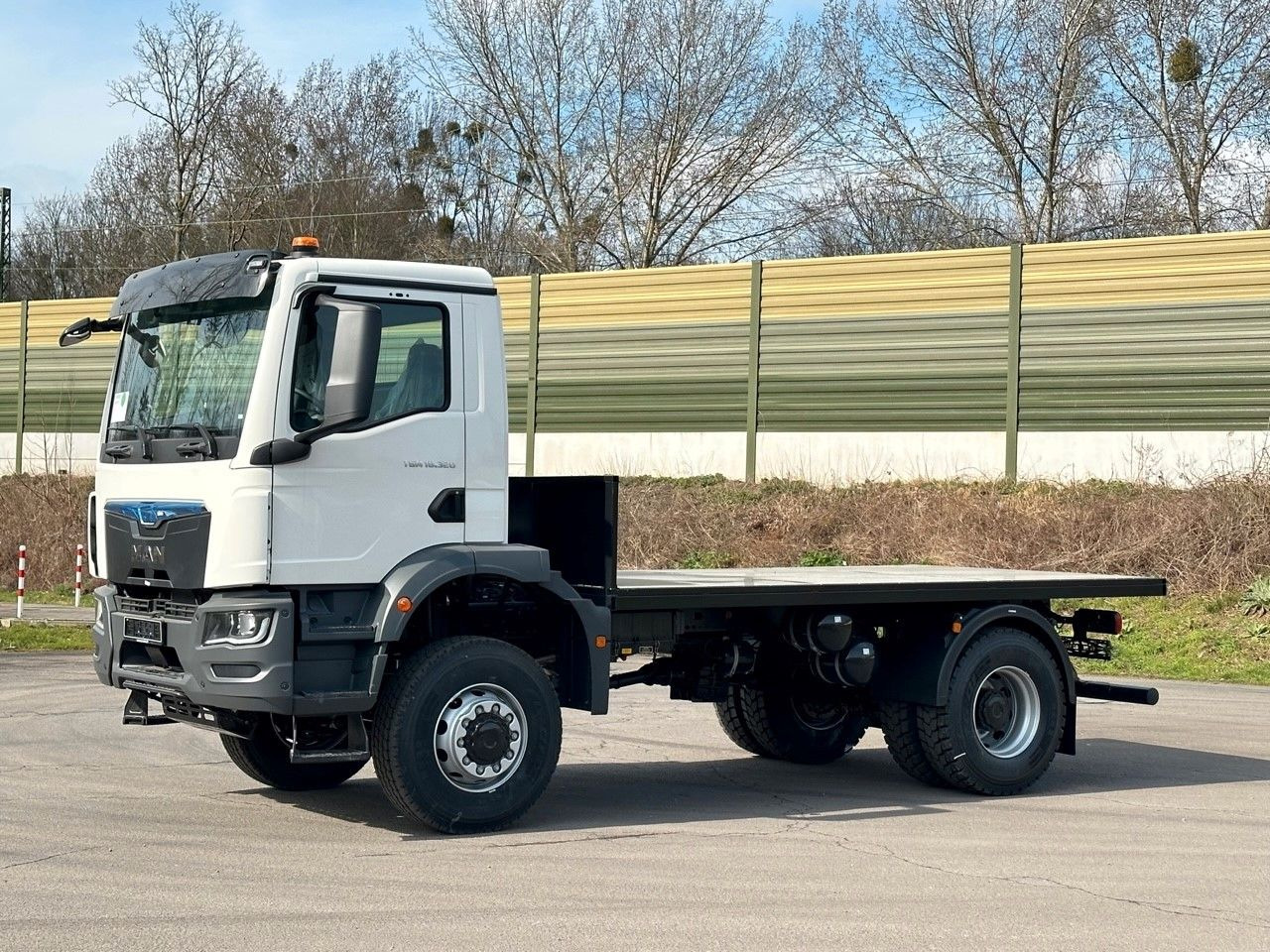 MAN TGM 18.320 4x4 Euro 6e Plato - Camión caja abierta: foto 2 MAN TGM 18.320 4x4 Euro 6e Plato - Camión caja abierta: foto 2