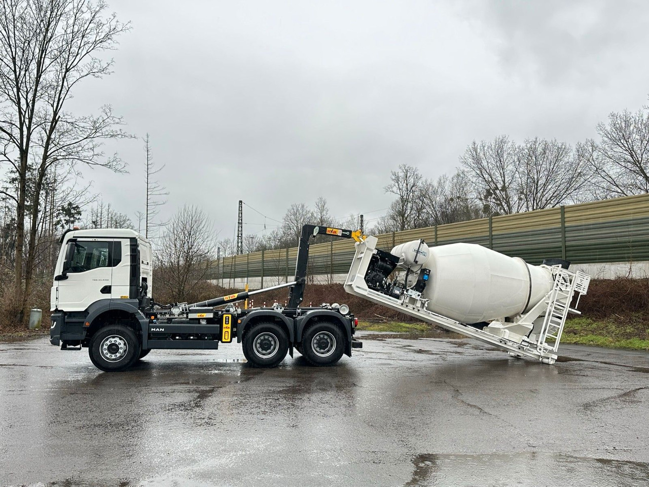 MAN TGS 33.440 6x4 Euro6e Abroller + Fahrmischer - Camión multibasculante, Camión grúa: foto 1 MAN TGS 33.440 6x4 Euro6e Abroller + Fahrmischer - Camión multibasculante, Camión grúa: foto 1