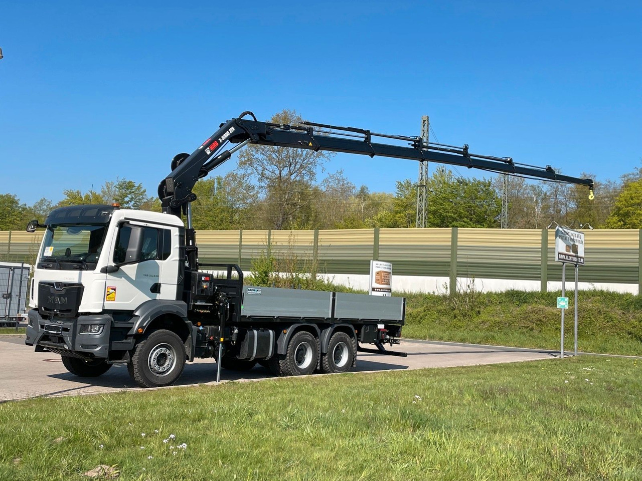 MAN TGS 33.440 6x4 HIAB 228-6 - Camión caja abierta, Camión grúa: foto 1 MAN TGS 33.440 6x4 HIAB 228-6 - Camión caja abierta, Camión grúa: foto 1
