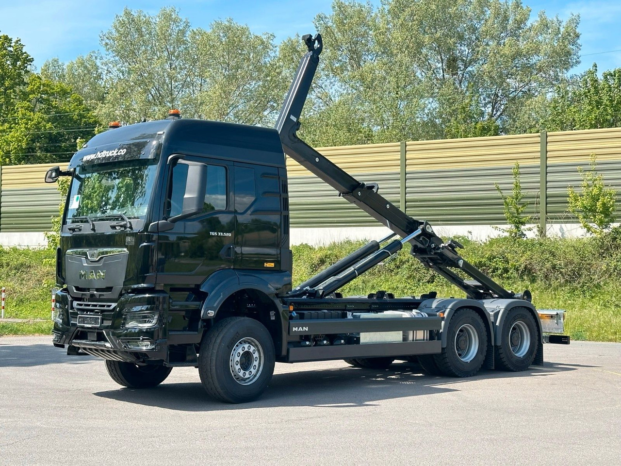 MAN TGS 33.520 6X4 Euro6e Abrollkipper MULTILIFT - Camión multibasculante, Camión grúa: foto 2 MAN TGS 33.520 6X4 Euro6e Abrollkipper MULTILIFT - Camión multibasculante, Camión grúa: foto 2