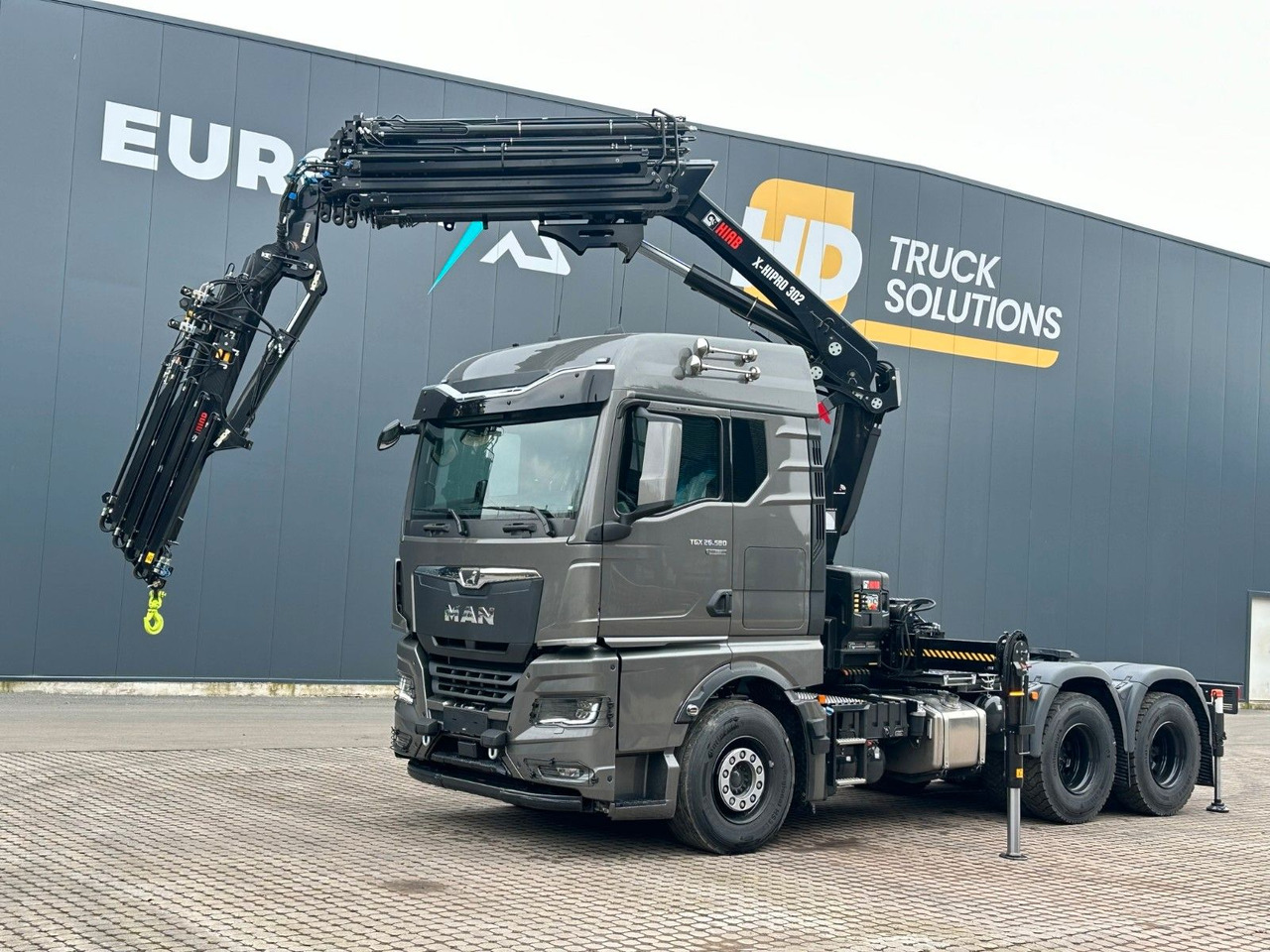 MAN TGX 26.580 6x4 Kran Hiab 302-6 + Jib-4 - Camión grúa: foto 1 MAN TGX 26.580 6x4 Kran Hiab 302-6 + Jib-4 - Camión grúa: foto 1
