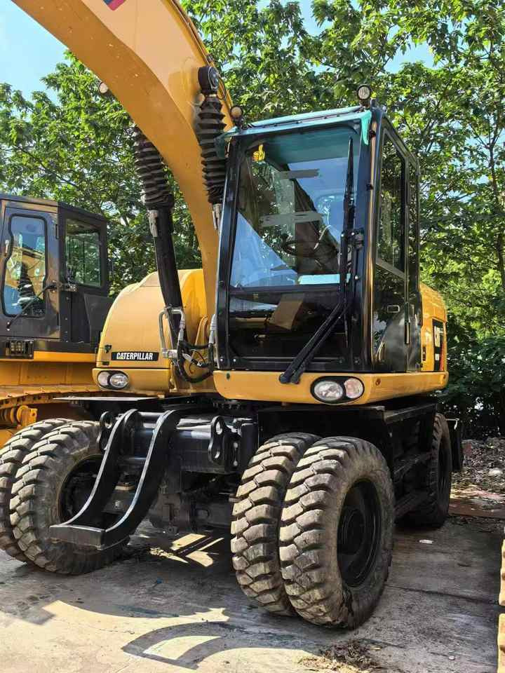 Used Caterpillar M315D2 Mini Wheel Excavator With Core Components for Diggers and Excavators - Excavadora de ruedas: foto 2 Used Caterpillar M315D2 Mini Wheel Excavator With Core Components for Diggers and Excavators - Excavadora de ruedas: foto 2