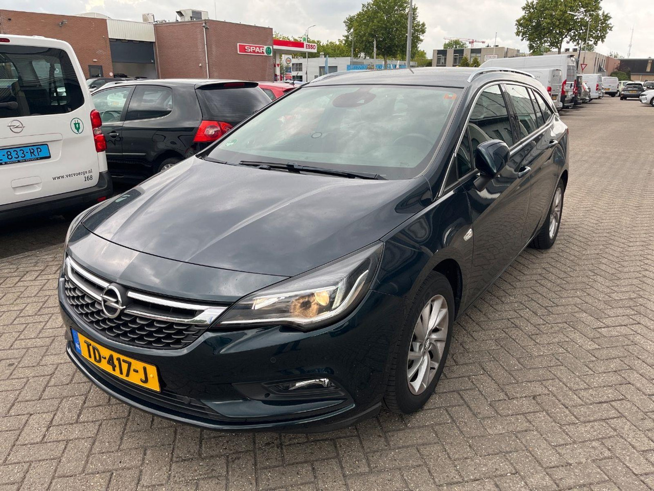 Opel Astra Sports Tourer 1.4 Business Executive | 2018 | 117.848 km | TD417J | NAP: Logisch - Coche: foto 1 Opel Astra Sports Tourer 1.4 Business Executive | 2018 | 117.848 km | TD417J | NAP: Logisch - Coche: foto 1
