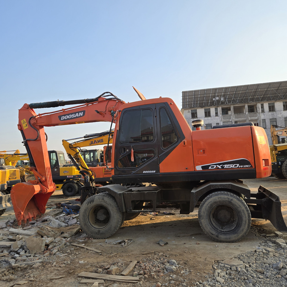 Doosan DX150W-9C - Excavadora de ruedas: foto 1 Doosan DX150W-9C - Excavadora de ruedas: foto 1