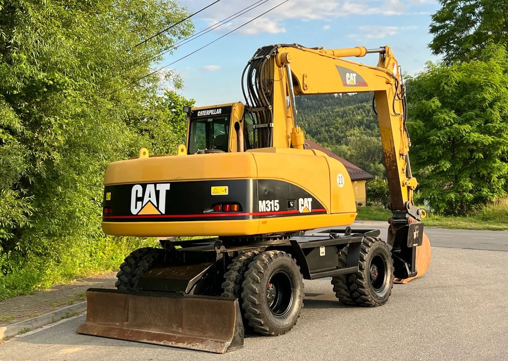 Excavadora de ruedas Caterpillar CAT M315C  CATERPILLAR SPROWADZONY  Bardzo Dobry Stan: foto 15 Excavadora de ruedas Caterpillar CAT M315C  CATERPILLAR SPROWADZONY  Bardzo Dobry Stan: foto 15