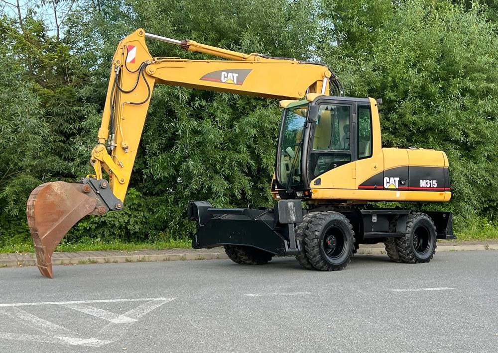 Caterpillar CAT M315C CATERPILLAR SPROWADZONY Bardzo Dobry Stan - Excavadora de ruedas: foto 1 Caterpillar CAT M315C CATERPILLAR SPROWADZONY Bardzo Dobry Stan - Excavadora de ruedas: foto 1