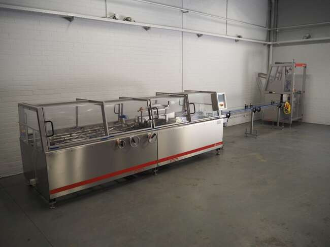 Schut Systems carton line EM60 - Máquina de embalaje: foto 1 Schut Systems carton line EM60 - Máquina de embalaje: foto 1
