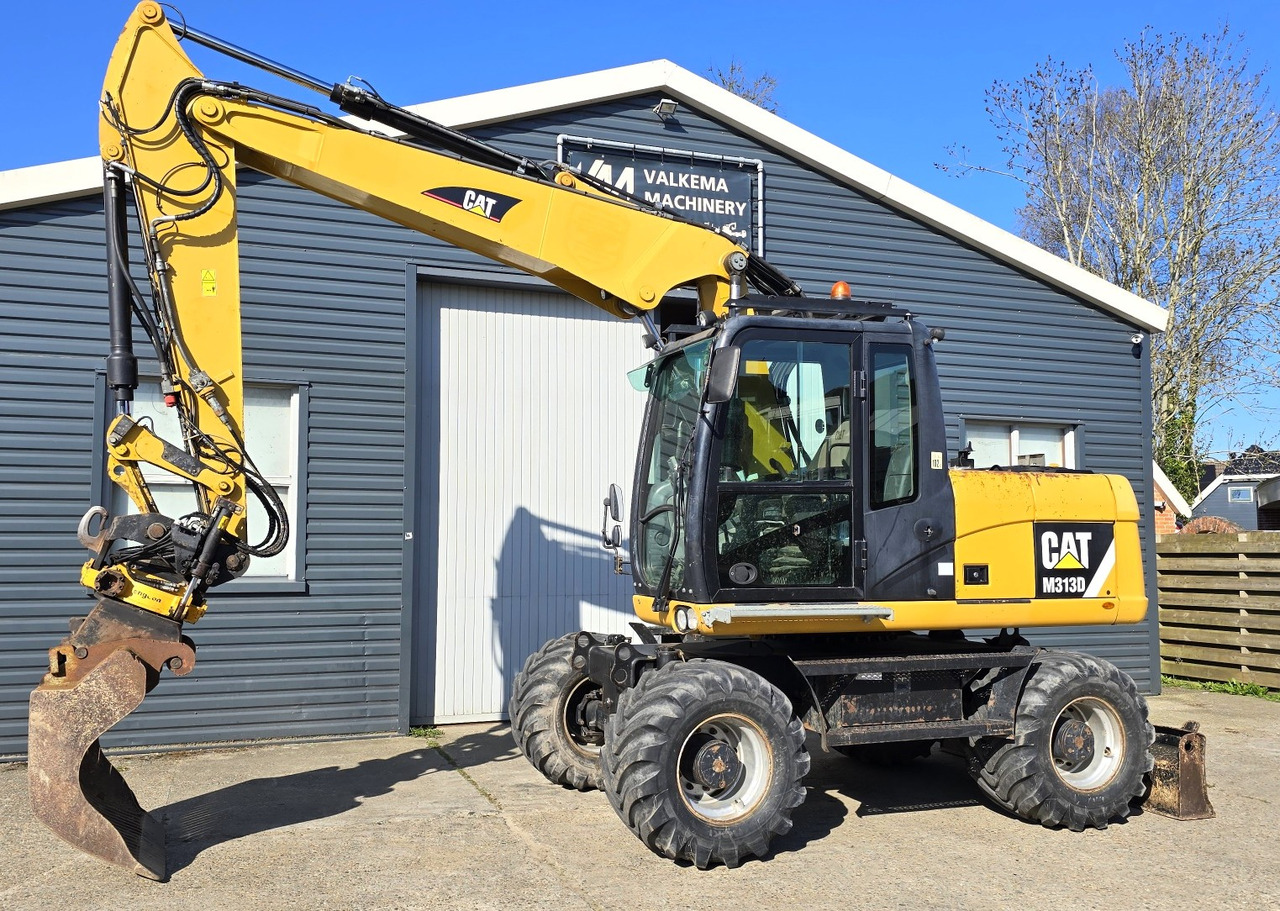 CATERPILLAR M313D - Excavadora de ruedas: foto 1 CATERPILLAR M313D - Excavadora de ruedas: foto 1