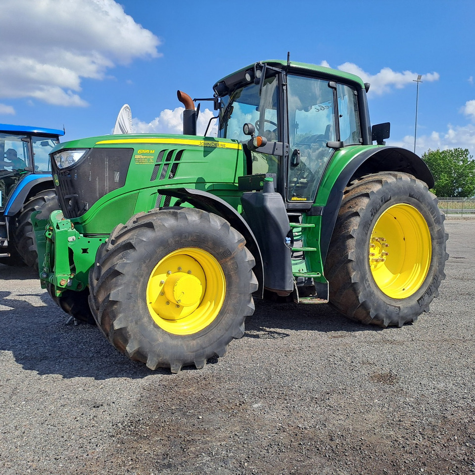 JOHN DEERE 6195M - Tractor: foto 1 JOHN DEERE 6195M - Tractor: foto 1