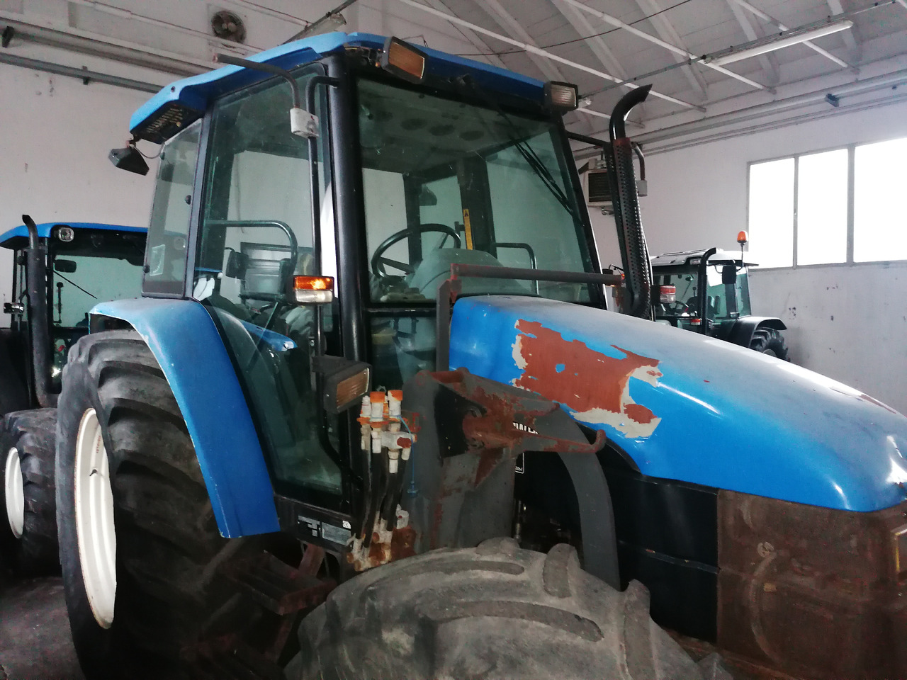 NEW HOLLAND TL 90 - Tractor: foto 1 NEW HOLLAND TL 90 - Tractor: foto 1