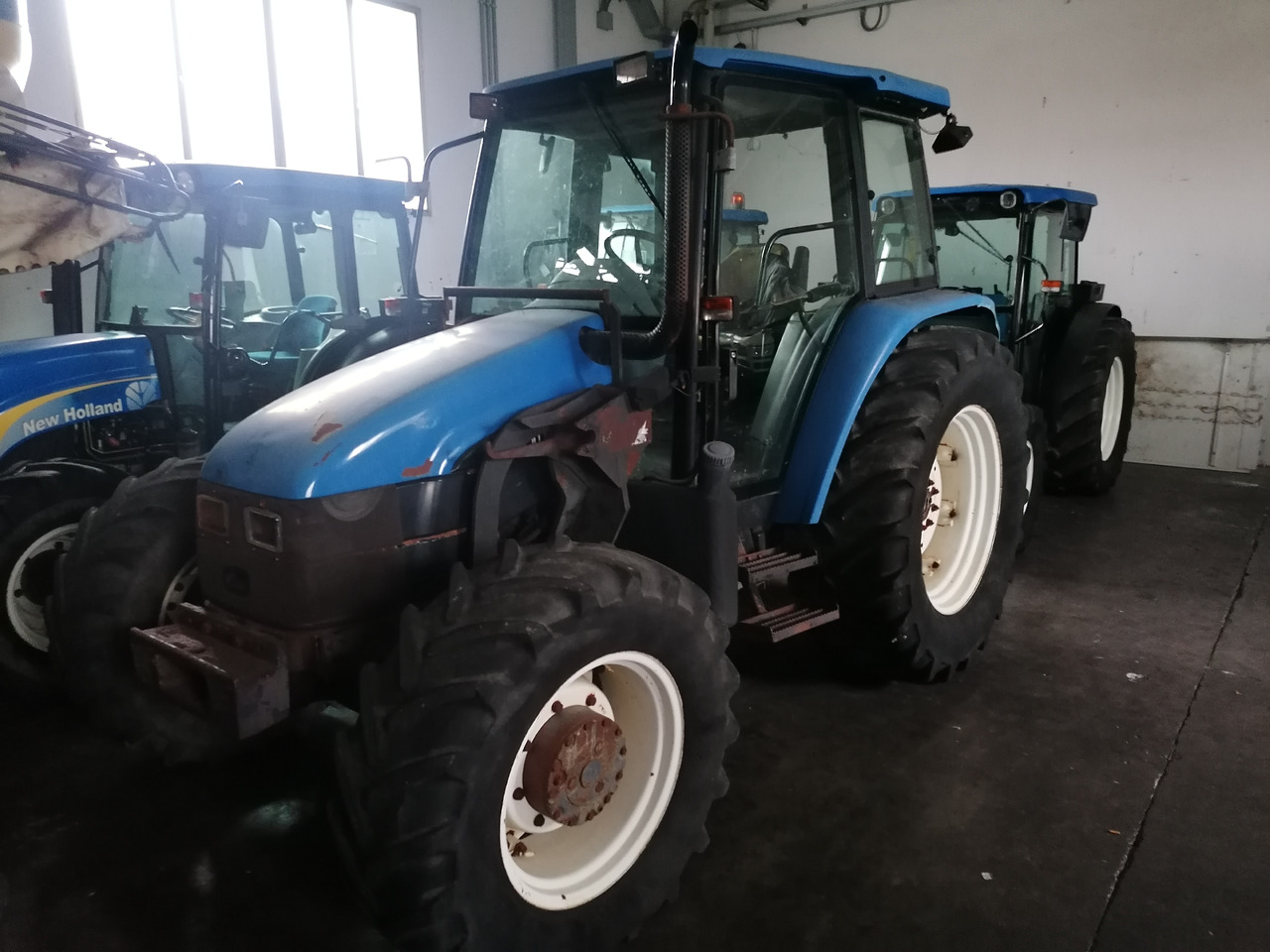 NEW HOLLAND TL 90 - Tractor: foto 3 NEW HOLLAND TL 90 - Tractor: foto 3
