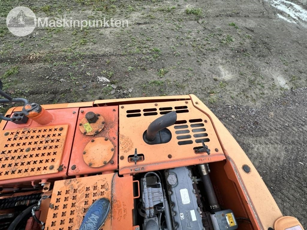 Excavadora de ruedas Doosan DX 140 W med vagn och redskap: foto 50