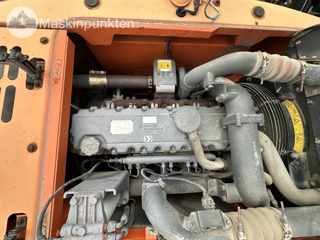 Excavadora de ruedas Doosan DX 140 W med vagn och redskap: foto 46