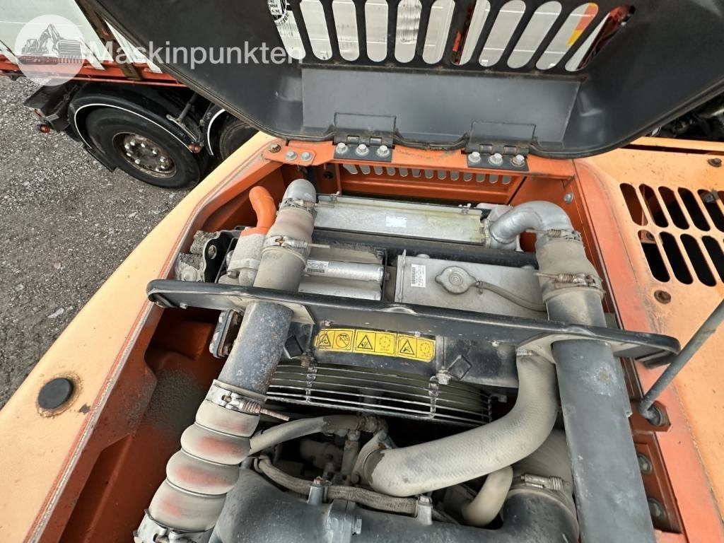 Excavadora de ruedas Doosan DX 140 W med vagn och redskap: foto 45