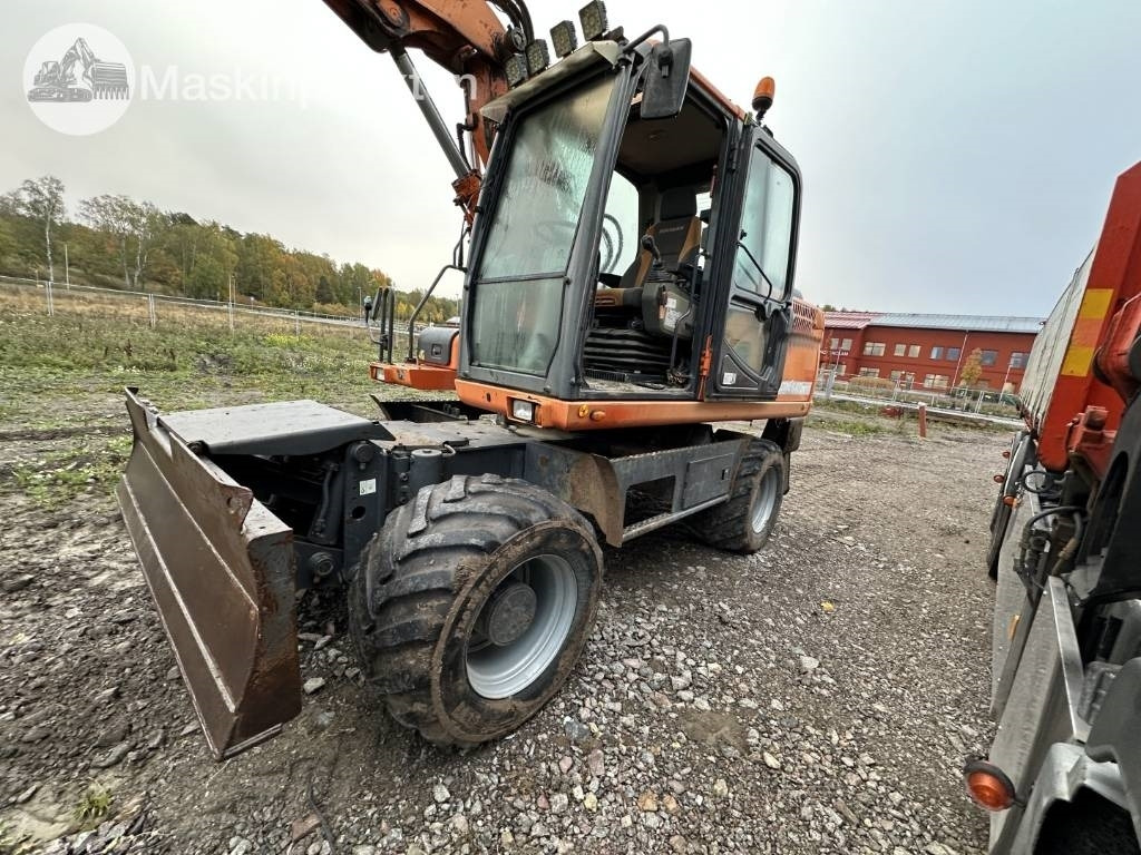 Excavadora de ruedas Doosan DX 140 W med vagn och redskap: foto 7