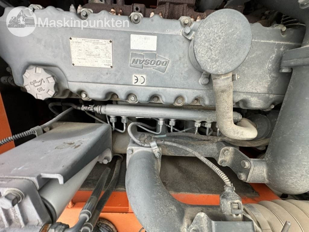 Excavadora de ruedas Doosan DX 140 W med vagn och redskap: foto 49