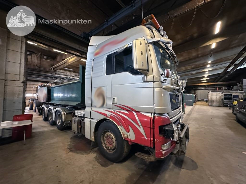 MAN TGX 35.540 - Camión multibasculante: foto 2 MAN TGX 35.540 - Camión multibasculante: foto 2