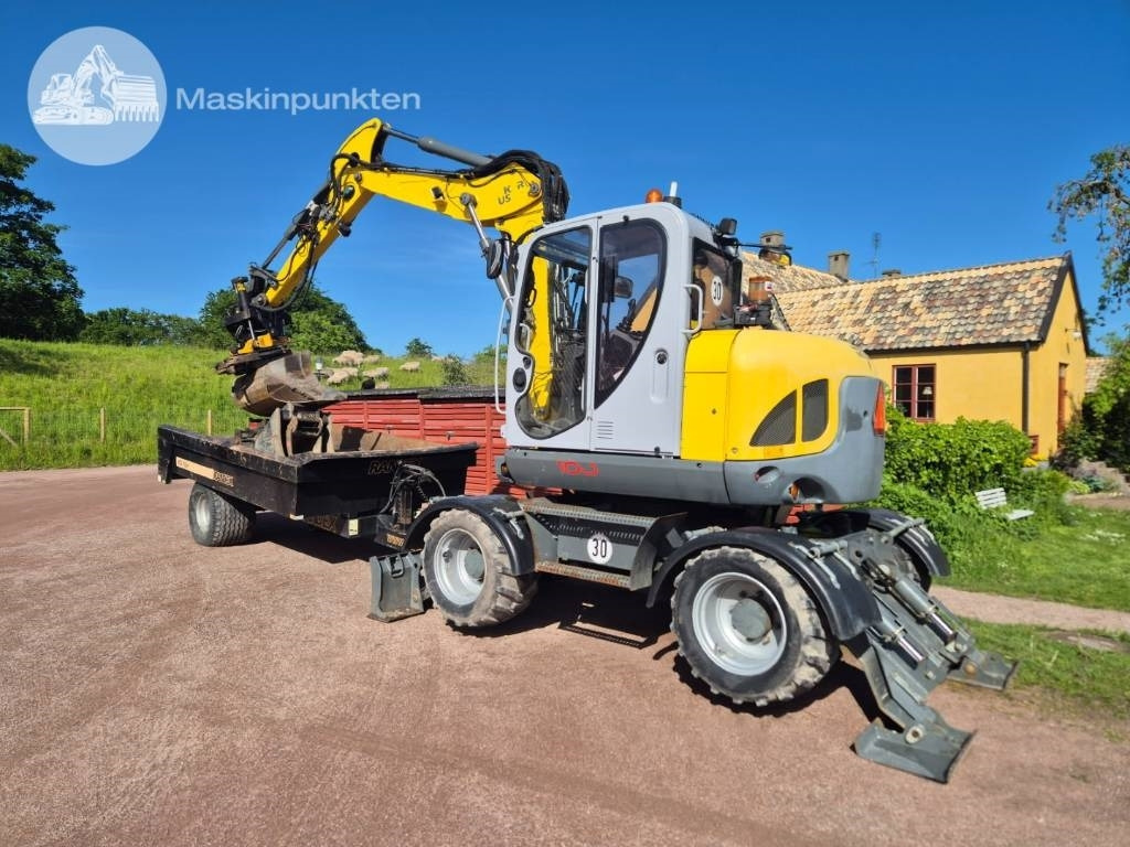 Wacker Neuson EW 100 med vagn - Excavadora de ruedas: foto 1 Wacker Neuson EW 100 med vagn - Excavadora de ruedas: foto 1