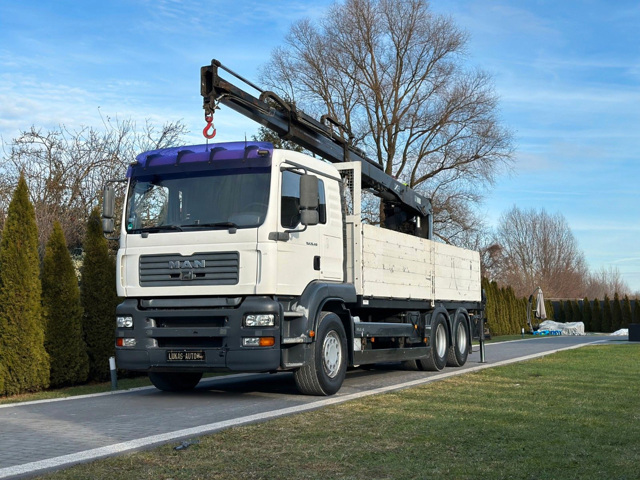 MAN TGA 26.410 6x4 HIAB MANUAL - Camión grúa: foto 1 MAN TGA 26.410 6x4 HIAB MANUAL - Camión grúa: foto 1