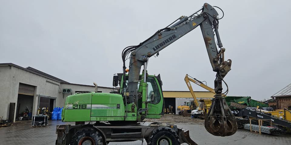 Koparka kołowa Liebherr A 316 Litronic chwytak podpory pług - Excavadora de ruedas: foto 4 Koparka kołowa Liebherr A 316 Litronic chwytak podpory pług - Excavadora de ruedas: foto 4