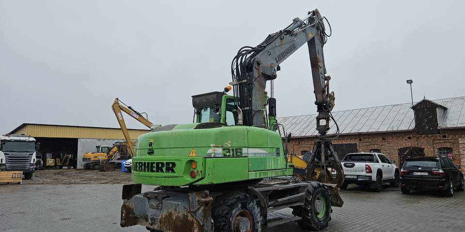 Koparka kołowa Liebherr A 316 Litronic chwytak podpory pług - Excavadora de ruedas: foto 5 Koparka kołowa Liebherr A 316 Litronic chwytak podpory pług - Excavadora de ruedas: foto 5