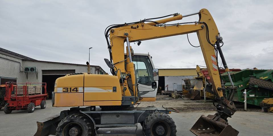 Koparka kołowa Liebherr A314 Litronic 9350 h+ 5 łyżek kołówka - Excavadora de ruedas: foto 5 Koparka kołowa Liebherr A314 Litronic 9350 h+ 5 łyżek kołówka - Excavadora de ruedas: foto 5