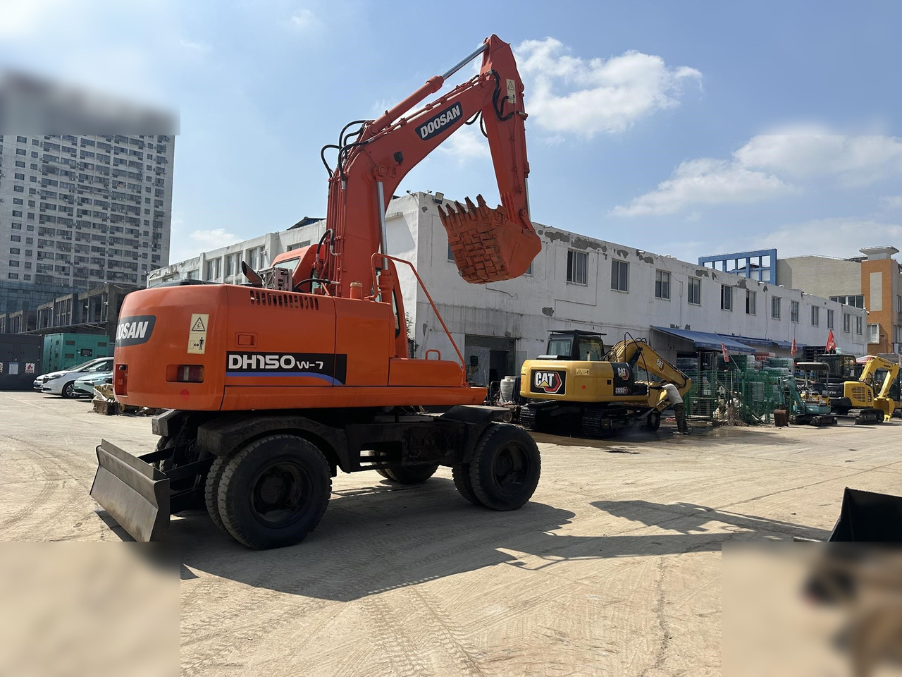 DOOSAN DH150W-7 - Excavadora de ruedas: foto 1 DOOSAN DH150W-7 - Excavadora de ruedas: foto 1