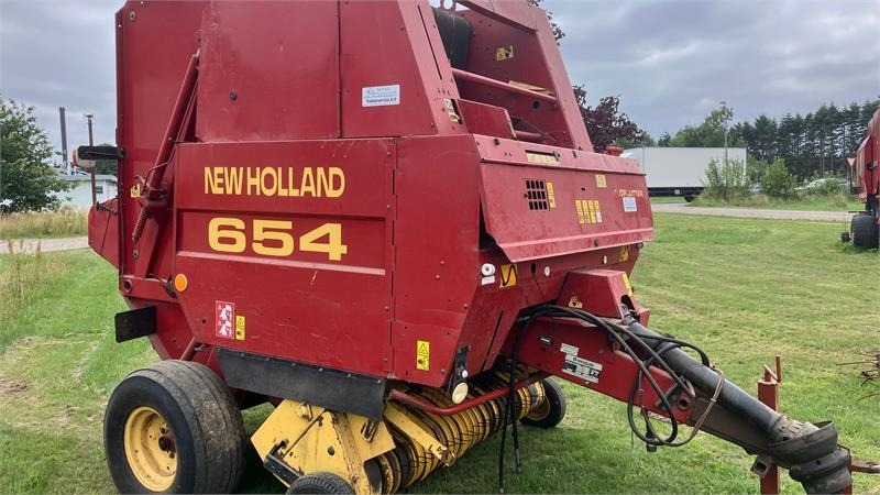 New Holland 654 RUNDBALLEPRESSER Cropcutter - Rotoempacadora: foto 1 New Holland 654 RUNDBALLEPRESSER Cropcutter - Rotoempacadora: foto 1