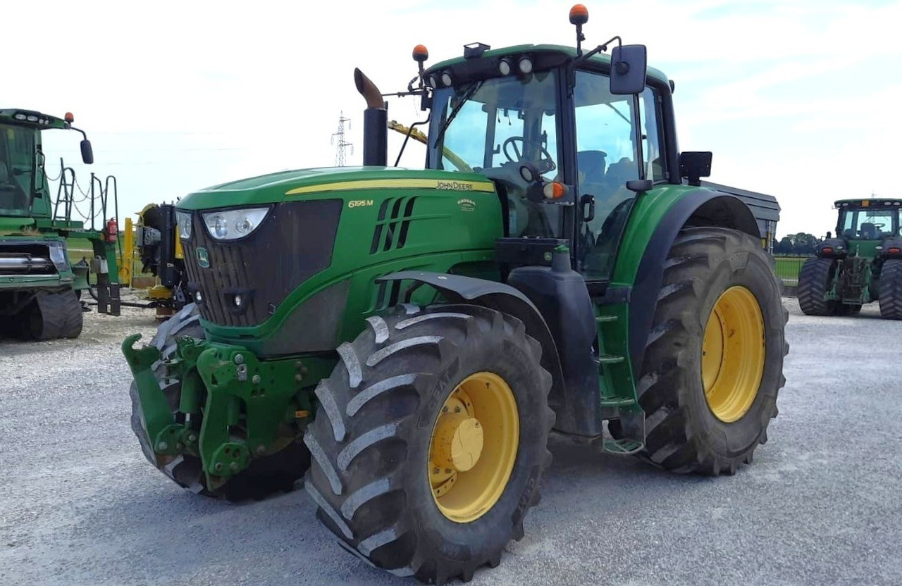 JOHN DEERE 6195 M - Tractor: foto 1 JOHN DEERE 6195 M - Tractor: foto 1