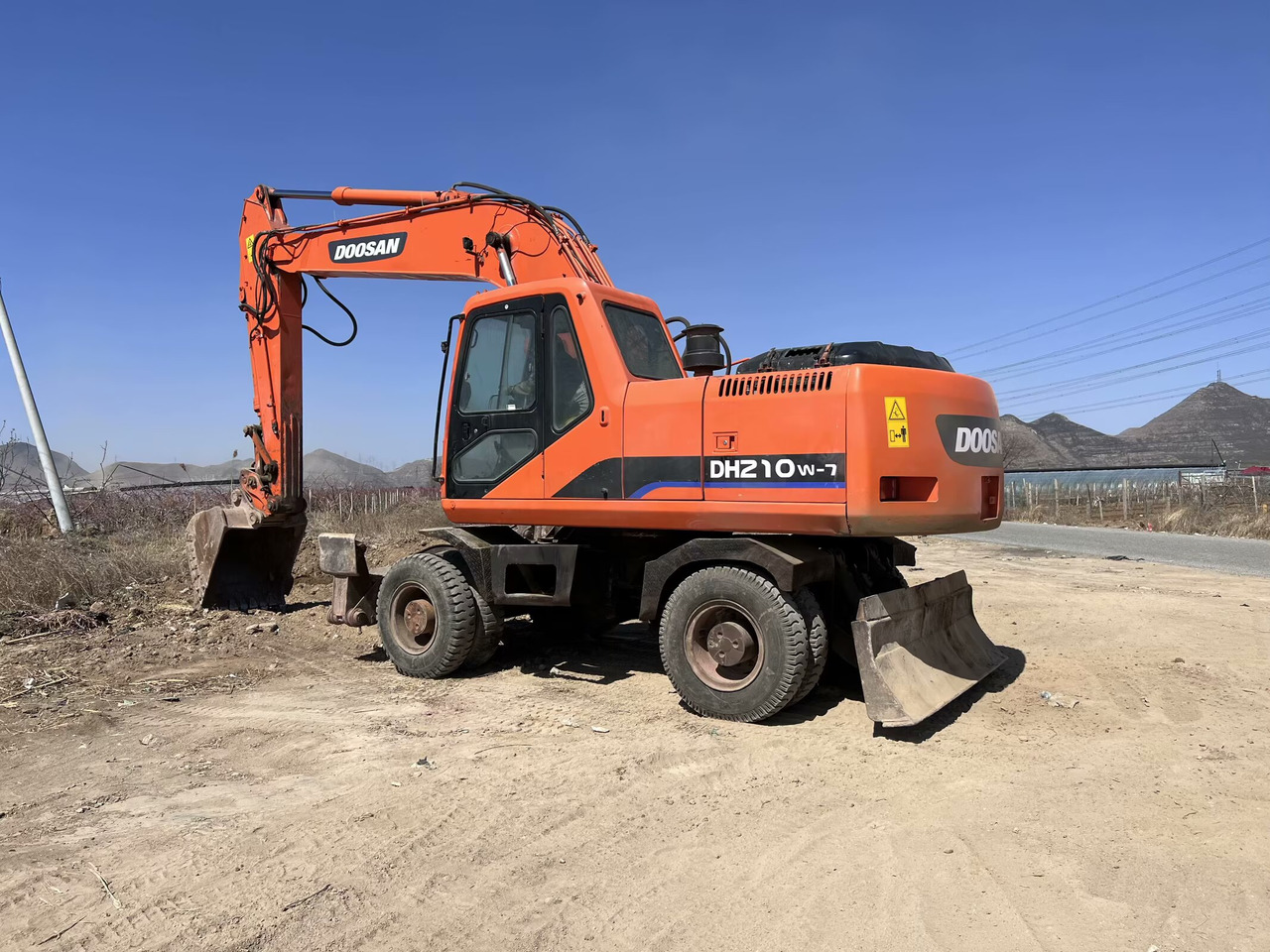 DOOSAN 210w - Excavadora de ruedas: foto 1 DOOSAN 210w - Excavadora de ruedas: foto 1