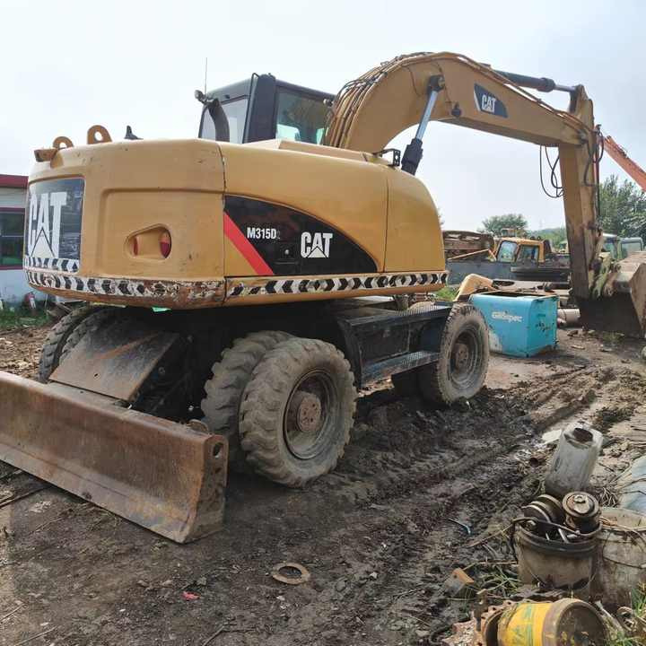 Used Digger Cat 315 Construction Machinery Construction Digger Used Cat 315 Cheap Excavator - Excavadora de ruedas: foto 3 Used Digger Cat 315 Construction Machinery Construction Digger Used Cat 315 Cheap Excavator - Excavadora de ruedas: foto 3