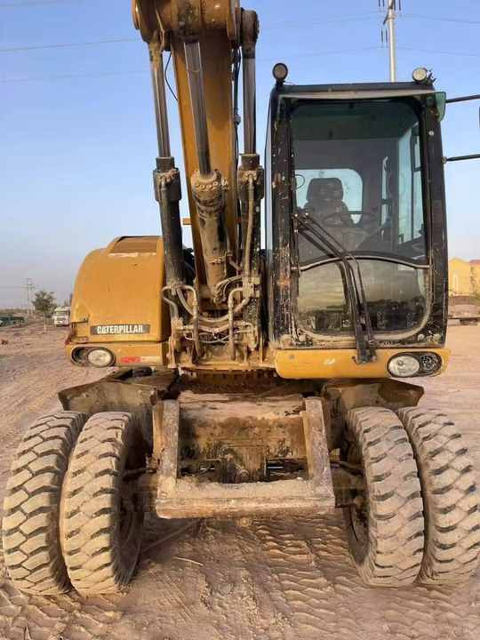 Used Digger Cat 315 Construction Machinery Construction Digger Used Cat 315 Cheap Excavator - Excavadora de ruedas: foto 2 Used Digger Cat 315 Construction Machinery Construction Digger Used Cat 315 Cheap Excavator - Excavadora de ruedas: foto 2