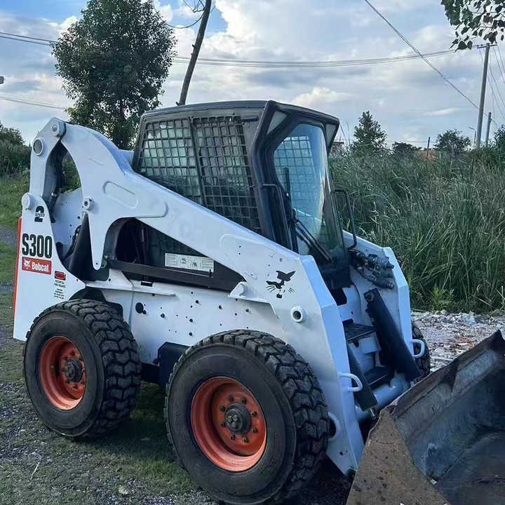 Used Bob Cat Bob Cat S300 Used Mini Skid Steer Wheel Loader Multifunctional Track Loaders Bobcat S300 - Cargadora de ruedas: foto 1 Used Bob Cat Bob Cat S300 Used Mini Skid Steer Wheel Loader Multifunctional Track Loaders Bobcat S300 - Cargadora de ruedas: foto 1