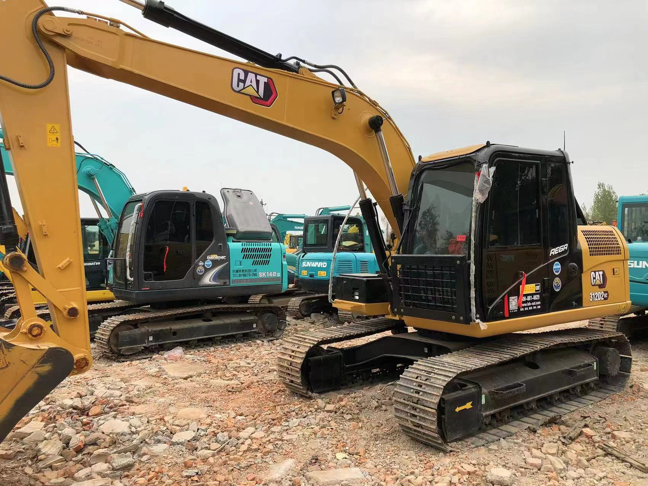 CATERPILLAR 312D12G Wheel Excavator Click for Discount - Excavadora de ruedas: foto 1 CATERPILLAR 312D12G Wheel Excavator Click for Discount - Excavadora de ruedas: foto 1
