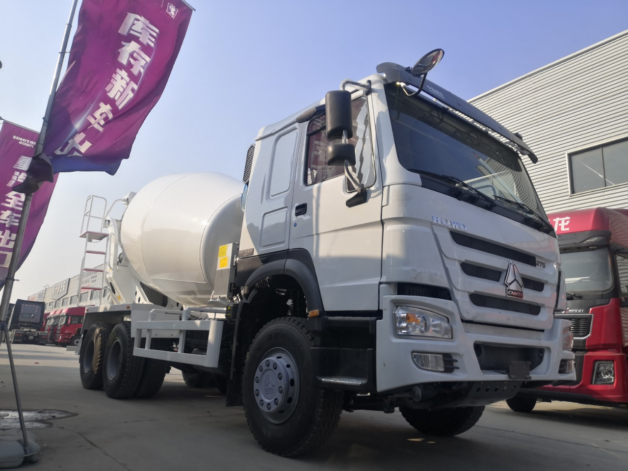 HOWO 10Cube Cement Mixer Truck 6*4 Click Here for Discount - Camión hormigonera: foto 1 HOWO 10Cube Cement Mixer Truck 6*4 Click Here for Discount - Camión hormigonera: foto 1