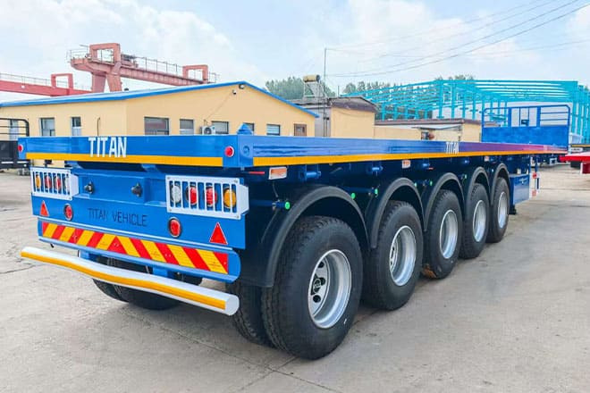 TITAN 5 Axle New Flatbed Trailers for Sale in Mauritius - Semirremolque plataforma/ Caja abierta: foto 1 TITAN 5 Axle New Flatbed Trailers for Sale in Mauritius - Semirremolque plataforma/ Caja abierta: foto 1