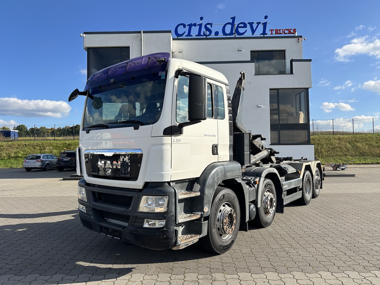 MAN TGS 35.400 8x2 Intarder Meiller Haken - Camión multibasculante: foto 1 MAN TGS 35.400 8x2 Intarder Meiller Haken - Camión multibasculante: foto 1