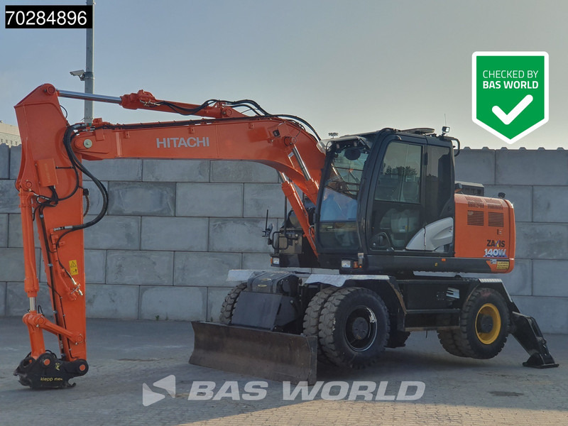 Hitachi ZX140W -6 OUTRIGGERS + BLADE - Excavadora de ruedas: foto 1 Hitachi ZX140W -6 OUTRIGGERS + BLADE - Excavadora de ruedas: foto 1