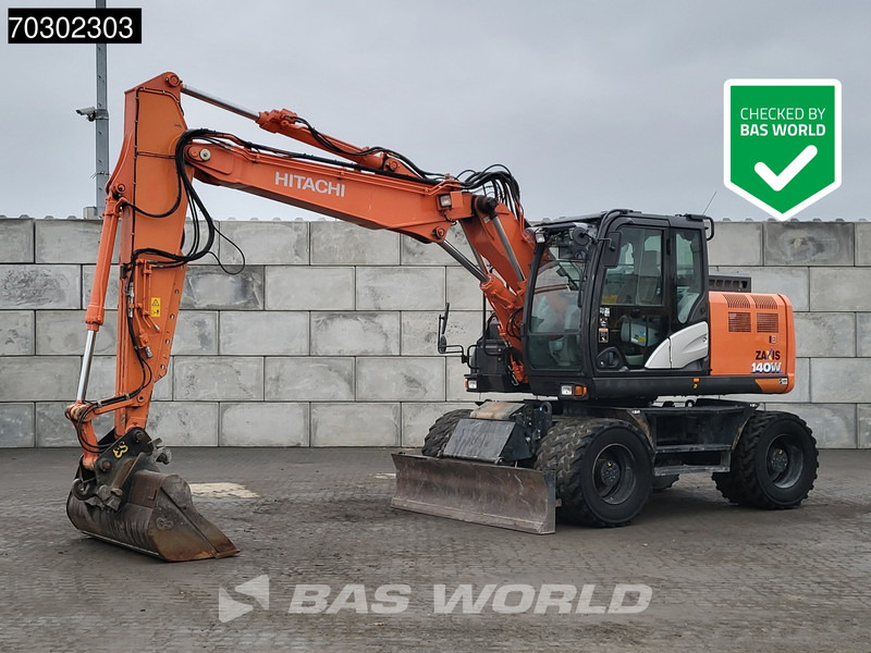 Hitachi ZX140W -6 - Excavadora de ruedas: foto 1 Hitachi ZX140W -6 - Excavadora de ruedas: foto 1
