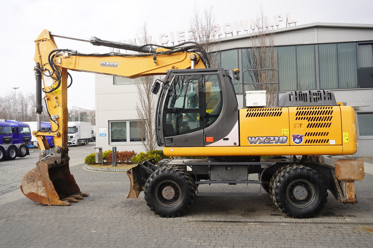 CASE WX218 / 23t wheeled excavator / 3 times folding arm - Excavadora de ruedas: foto 1 CASE WX218 / 23t wheeled excavator / 3 times folding arm - Excavadora de ruedas: foto 1