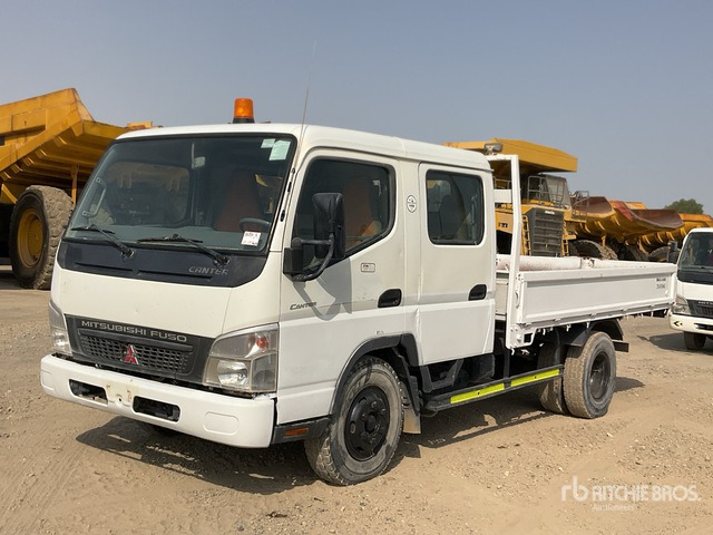 2014 Mitsubishi Canter 4x2 Crew Cab Flatbed Truck - Camión caja abierta: foto 1 2014 Mitsubishi Canter 4x2 Crew Cab Flatbed Truck - Camión caja abierta: foto 1
