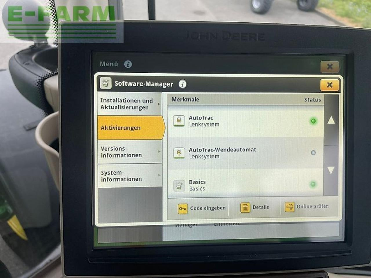 Tractor John Deere 6215r: foto 18