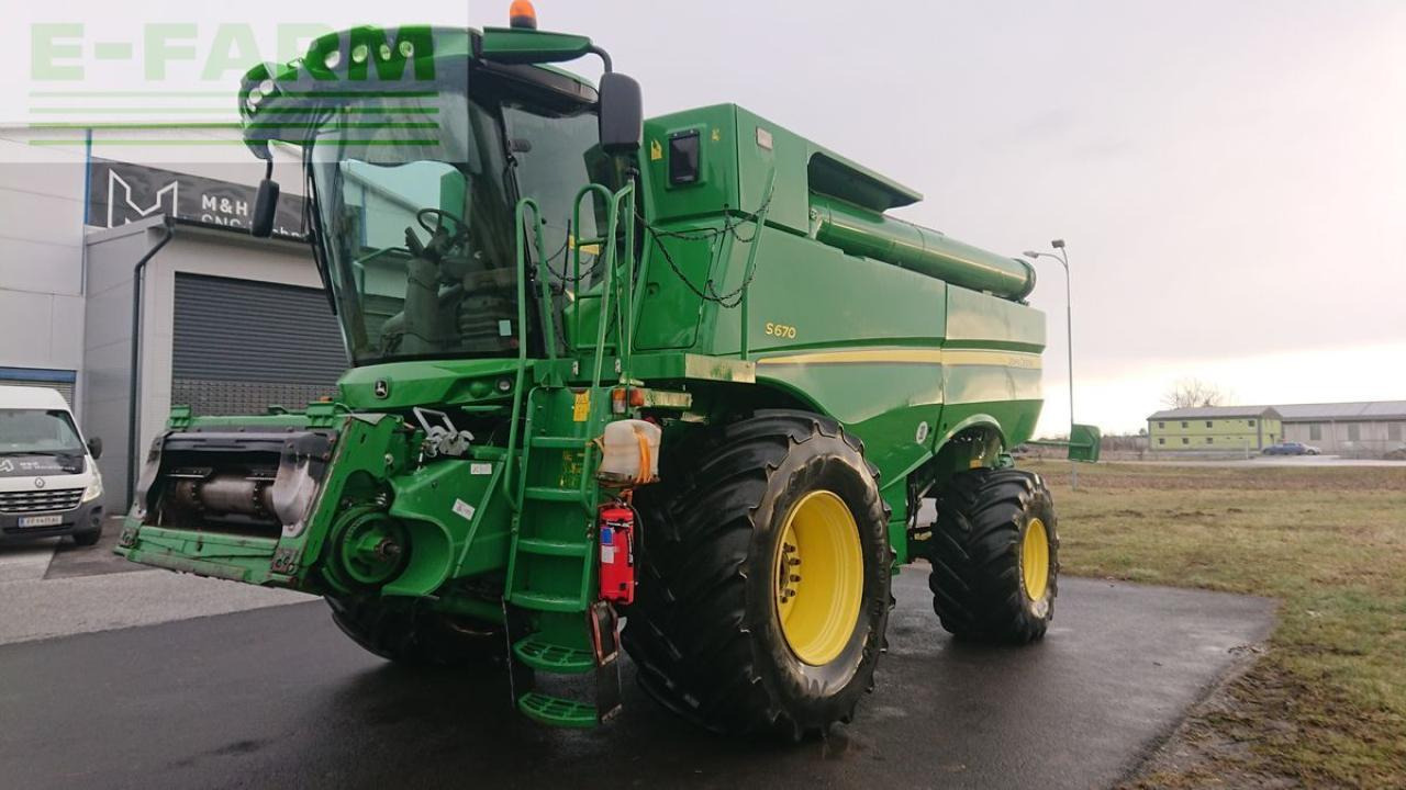 John Deere s670 4wd + macdon fd75 - Cosechadora de granos: foto 1 John Deere s670 4wd + macdon fd75 - Cosechadora de granos: foto 1