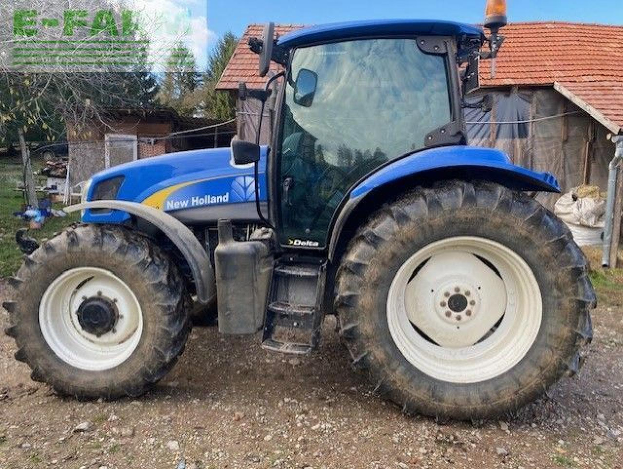 New Holland T6030 Delta Delta - Tractor: foto 1 New Holland T6030 Delta Delta - Tractor: foto 1