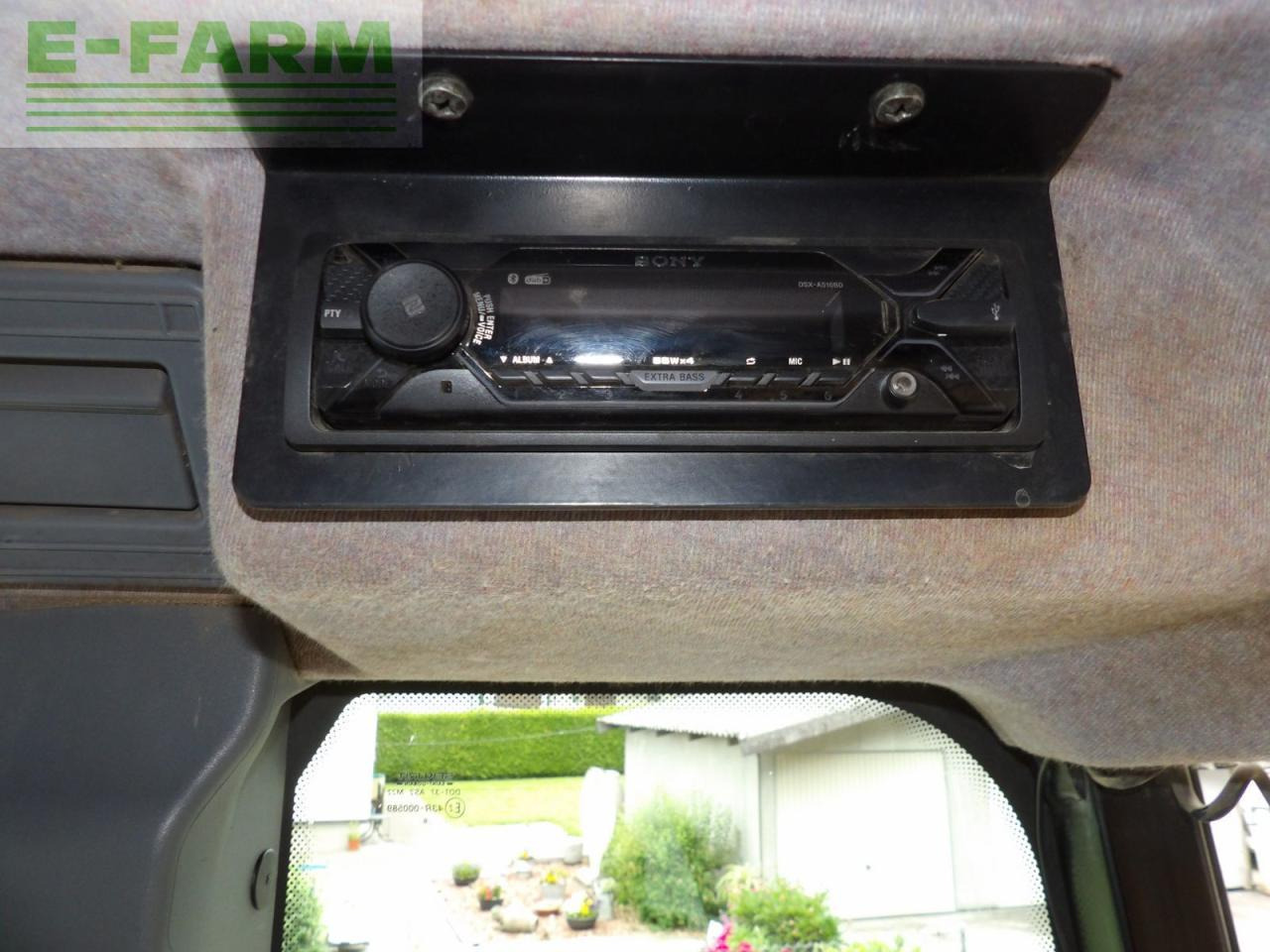 Tractor New Holland new holland tn 95 da DA: foto 6 Tractor New Holland new holland tn 95 da DA: foto 6